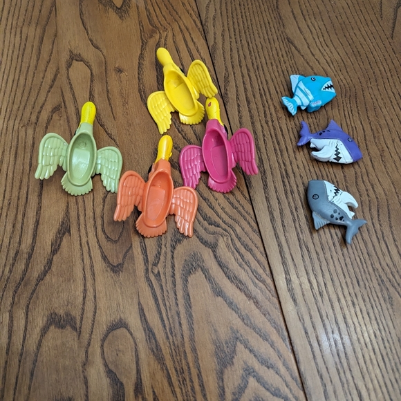 Diving toys. Pelicans and sharks. Could be used as bath tub or pool toys. GUC - Picture 2 of 4